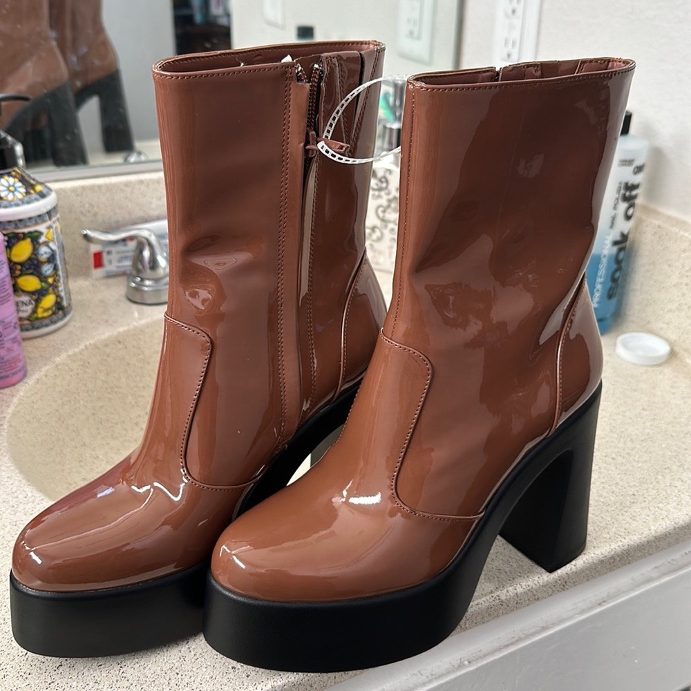 GB.   Ankle boot.  I have.  1.   Size.  8.5.  And.  1.  Size.  6.5